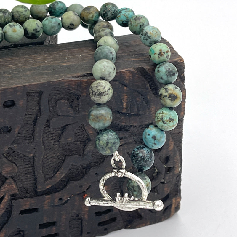 African Turquoise Gem Necklace with Antique Silver Shell Clam Charm