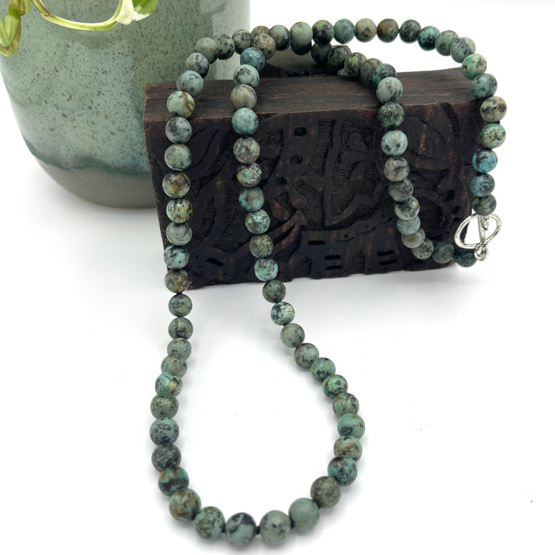 African Turquoise Gem Necklace with Antique Silver Shell Clam Charm